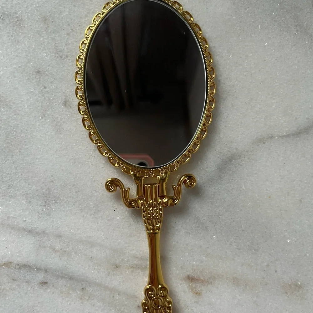 Izzy and Liv gold Fold Away Hand Mirror adjustable